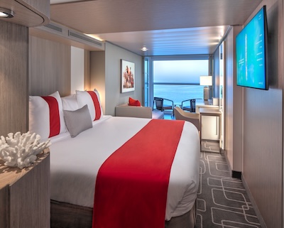 Infinite Veranda Stateroom on Celebrity Beyond with floor-to-ceiling windows opening to the ocean, a popular choice for the Christian Marriage Cruise.