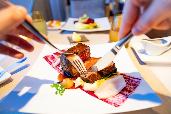 Elegant specialty dining at Blu restaurant aboard a Christian marriage cruise on the Celebrity Summit.