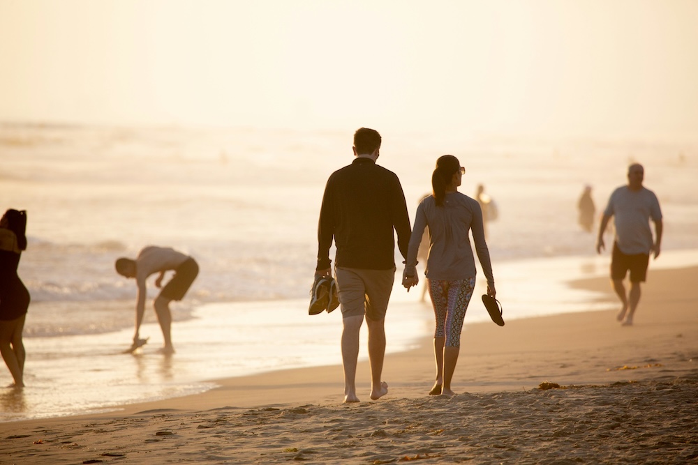 couple-walking-beach-christian-retreat - The Marriage Cruise for Christian Couples christian marriage retreat couples, couple walking on a quiet beach at golden hour