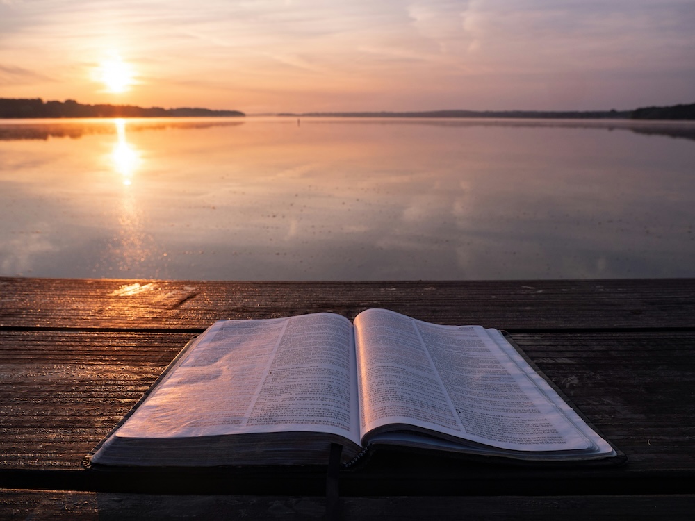 faith-integrated-marriage-retreat-bible - The Marriage Cruise for Christian Couples faith based marriage retreats, open Bible in warm morning light